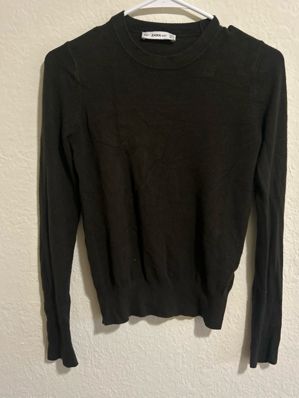 Zara long sleeve sweater with gold buttons on the sleeve